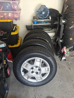 215/70/16 tires & rims