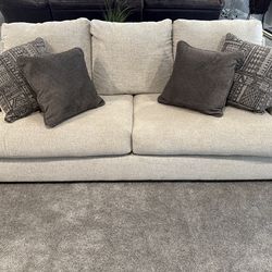Light Gray Sofa with Decorative Pillows