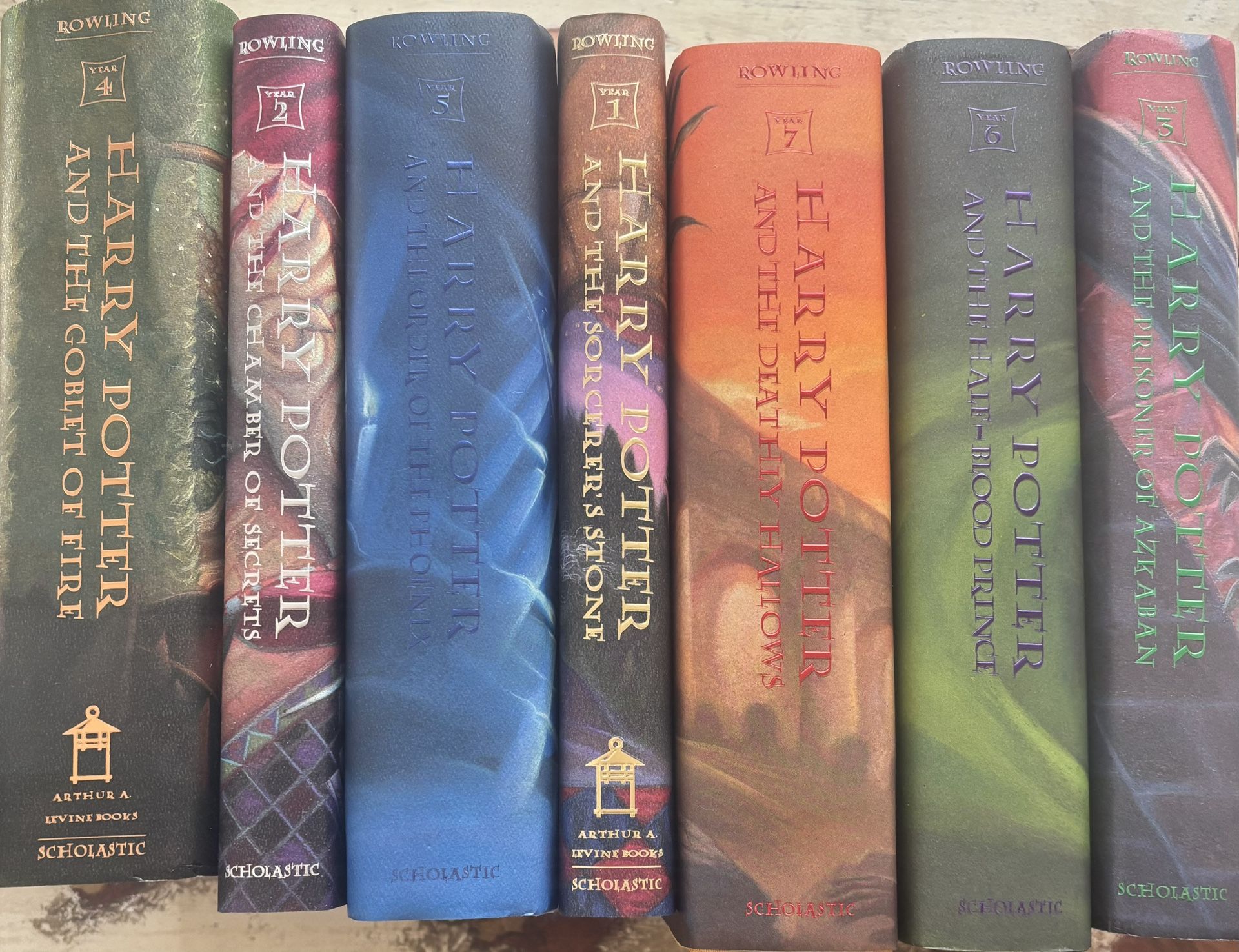 Full set of Harry Potter hardback books. Never been read.