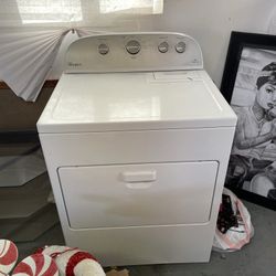 White Whirlpool Electric Dryer With AccuDry Sensor drying system 