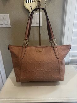 Coach Signature Embossed Leather Tote Bag