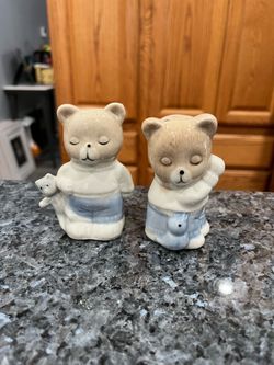 Ceramic Bears With A Toy Pair of salt and pepper shakers.  Size approximately 3 1/2 inches tall.  Preowned