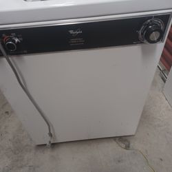 Whirlpool, 24 inch apartment size washing machine top loading works.Good thirty day warranty delivery available