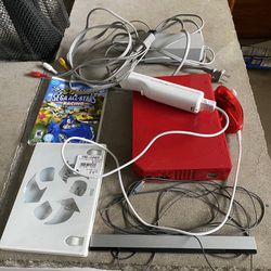 Red Nintendo Wii With 2games