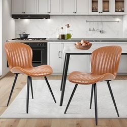 Brand new faux leather chairs 2pcs