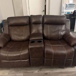 brown leather couch/loveseat