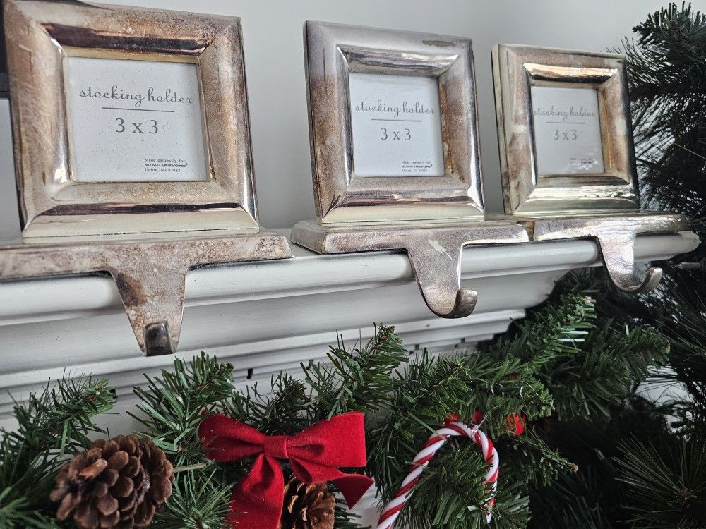 $15.00 - (3) Christmas Fireplace Stocking Holder & Photo Frame! Very Heavy/Silver Tone! Each boxed! Needs Polishing!