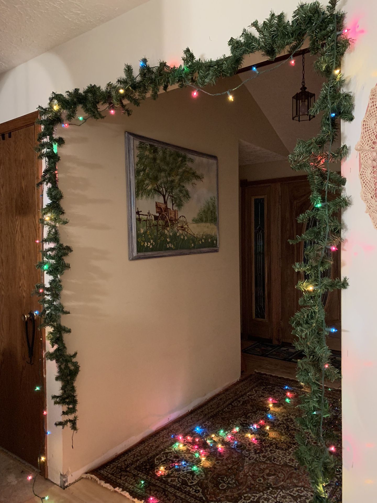 Christmas Decor…2-8.3/4ft. Green garland swags and strand of 200 multi color steady/blinking lights!