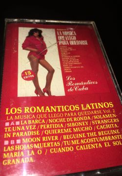 See Photos. Los romanticos latinos audio cassette"