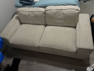 Ivory Loveseat Couch