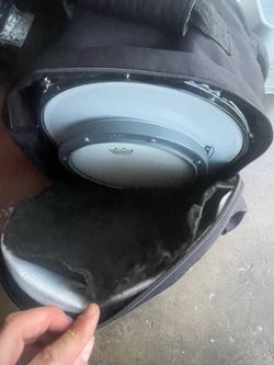 Snare, practice pad, sticks, and worn case