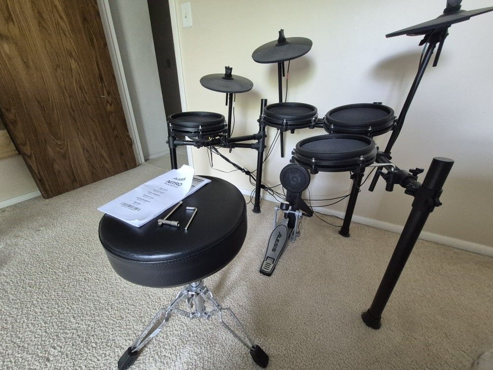 Alesis Nitro Mesh Drum Kit + Chair & Drumsticks