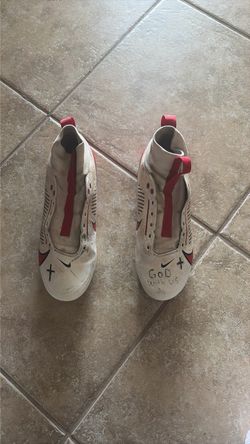 Red and white cleats