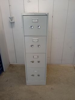 Metal file cabinet $ 65 no.key
