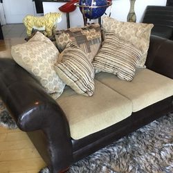 Brown Leather Loveseat With Throw Pillows