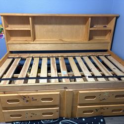 Twin bed with book case