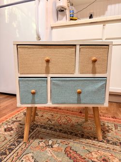 Adorable side table with fabric drawers