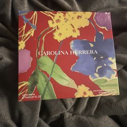 Carolina Herrera yellow and purple floral perfume good girl 