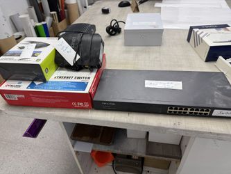 Various Items KVM, 4 Port WiFi Router, 24 Port Internet Switch 16 Port Switch Gigabit