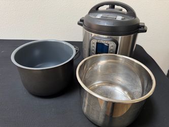 Instant Pot Electric Pressure Cooker with Two Inner Pots