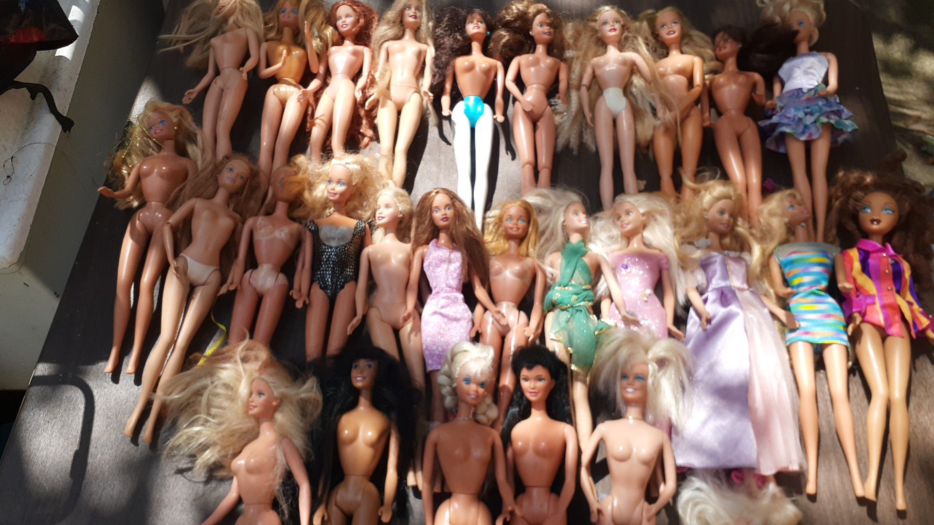 28 Barbie Dolls..vintage to now