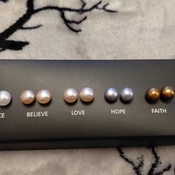 Set of Avon freshwater pearl stud earrings.