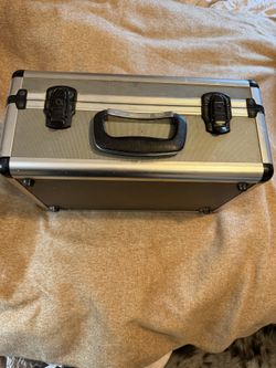 CASE, METAL  16"w x 10"deep x 7"high; cross streets are Arapaho & Waterview