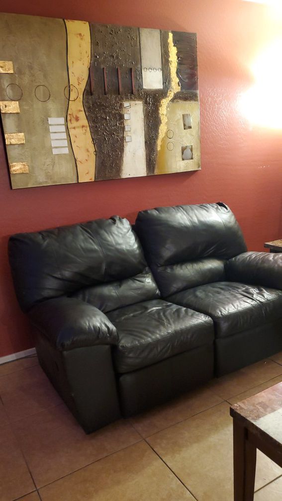 Black leather recliners set with coffee tables