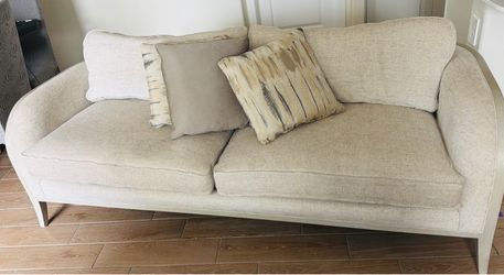 Beige Upholstered Two-Seat Sofa