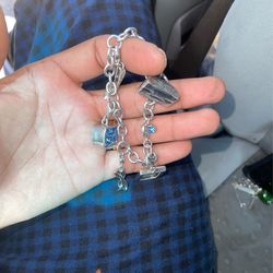 JUDITH LEIBER CRYSTAL CHARM BRACELET