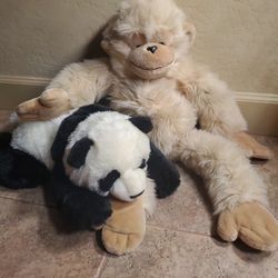 Large monkey And Stuffed Panda