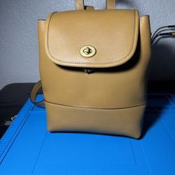 coach turnlock backpack honey brown