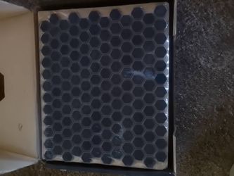 Mesh mounted porcelain mosaic tiles