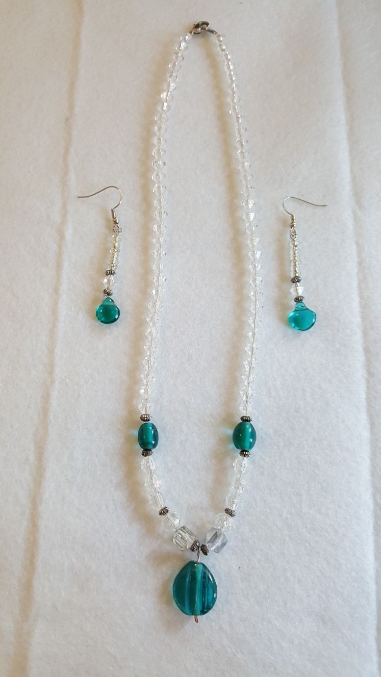 Turquoise stone with glass beads and earrings