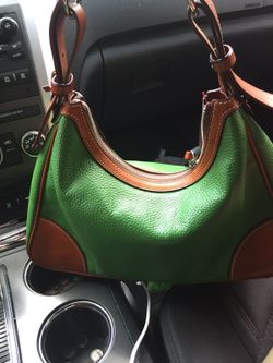 Dooney n bourke new with coin purse authentic green and brown leather really nice gift or just because