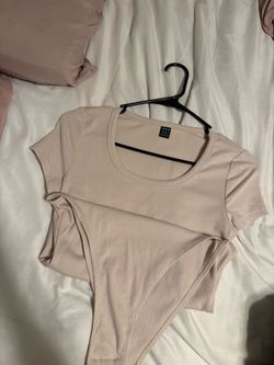 Tan body suit