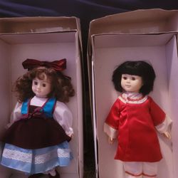 Two Porcelain Precious Dolls By RUSS