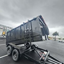 NEW DUMP TRAILER 8X12X4 12000 LBS
ROLLING TARP--SPARE TIRE,ELECTRIC BRAKES,HYDRAULIC SYSTEM,REMOTE CONTROL,IDEAL FOR HAULING, DEMOLITION, TRASH ETC,FO