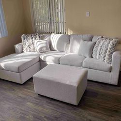 Brand New Sectional With Free Ottoman 