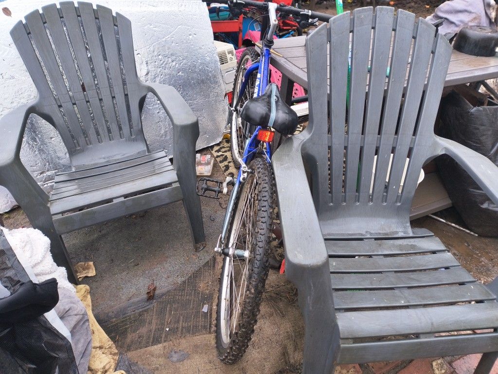 2 Plastic Adirondack Chairs