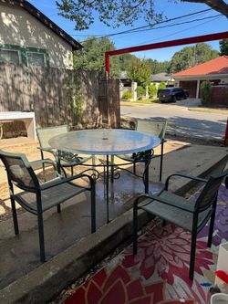 IRON & GLASS PATIO TABLE & 4 CHAIRS