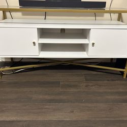 White and gold tv cabinet