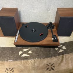 This item is a turntable set, similar to models like the Argon Audio TT-3 NEW COST $299. The product is in working order and is the one pictured, PLUS