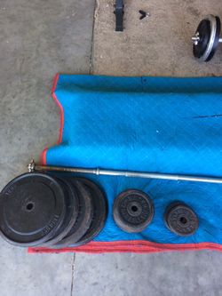(2) 25 lb plates + (6) 5 lb plates + bar