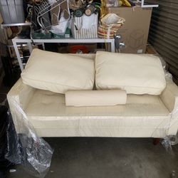 Bob’s furniture, White leather couch