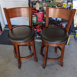 2  Standard Barstools Solid Wood Still In Decent Condition