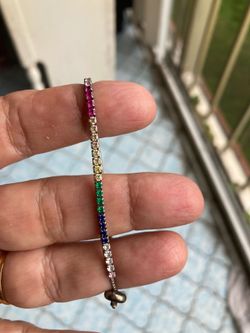 Real sterling silver bracelet with genuine ruby emerald for $30