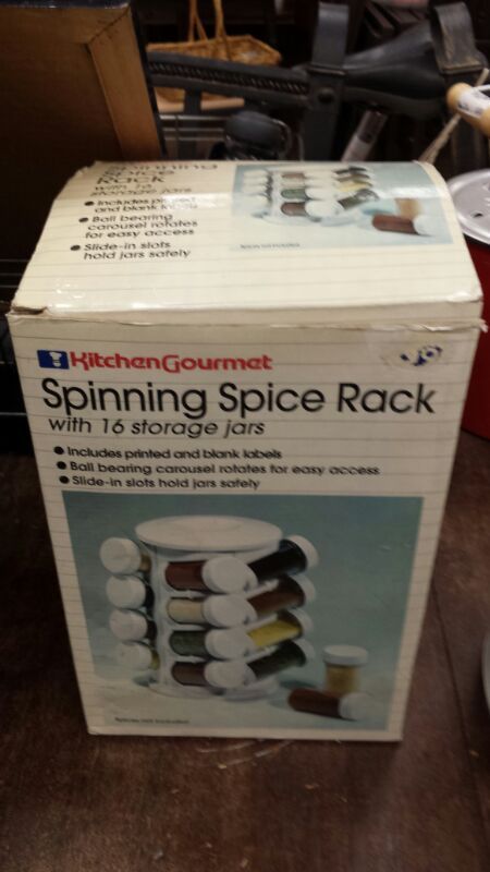 Brand new in the box kitchen gourmet spinning spice rack with 16 storage jars