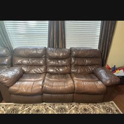 Ashley Sofa And Love Seat With 4 Recliners 