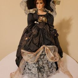Haunted Musical Porcelain Doll